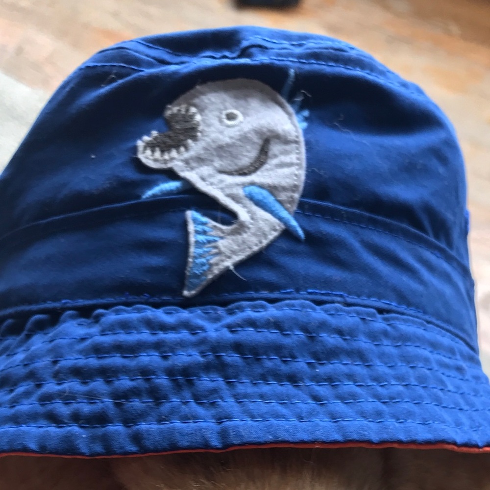 Baby gap toddler hat with fish detail.